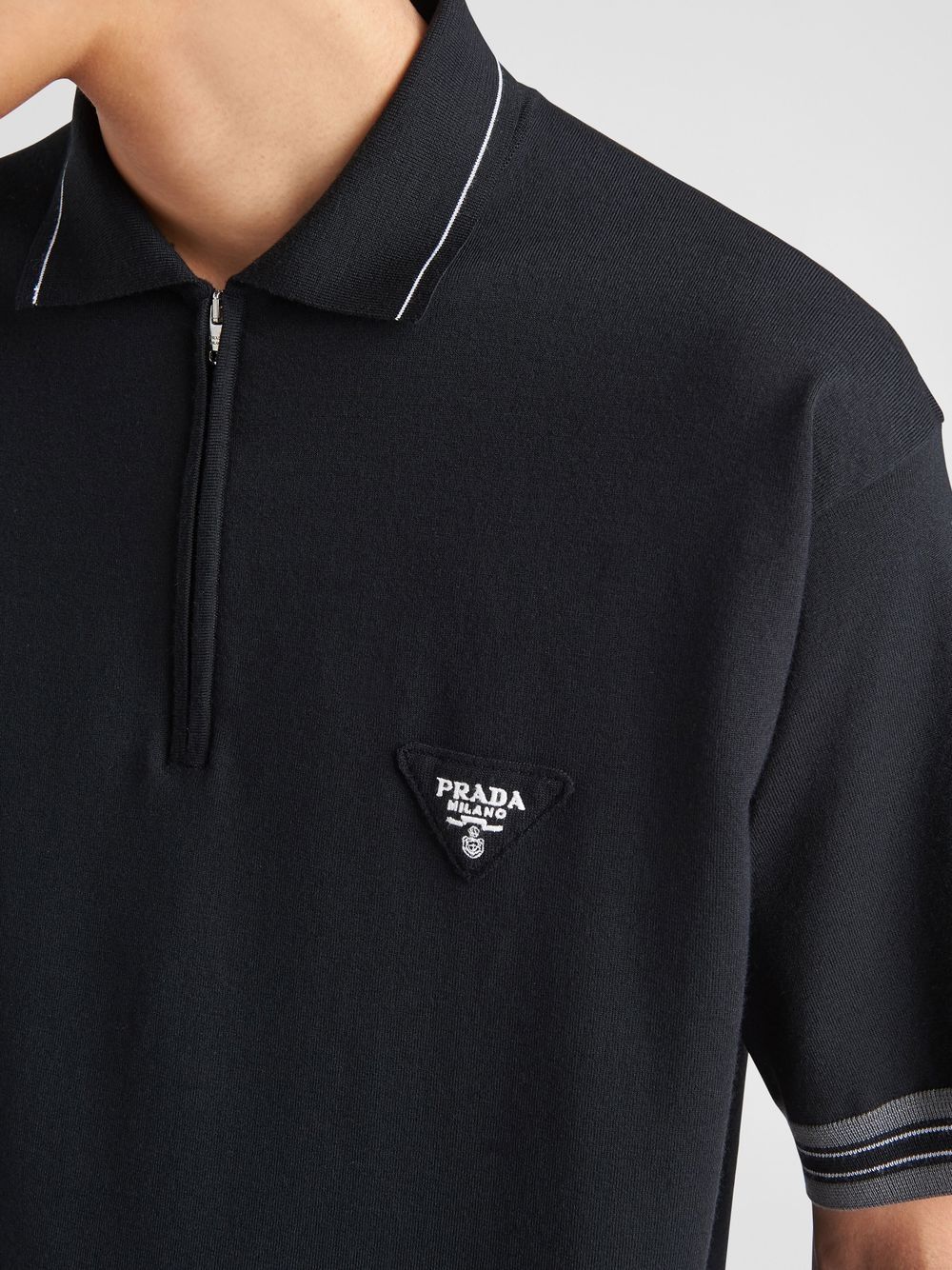 POLO PRADA CON ZIP